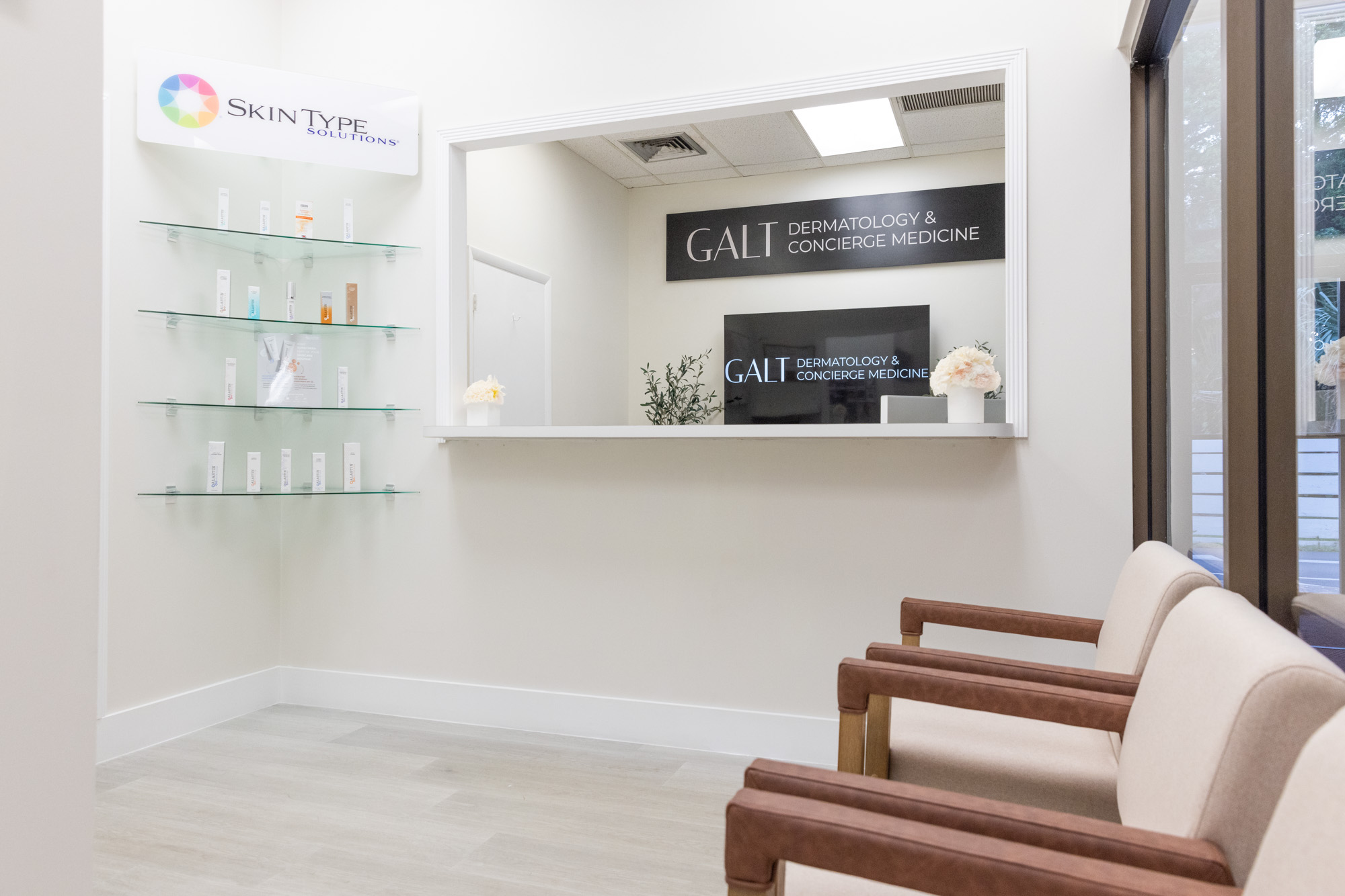 The sleek and comfortable waiting room at Galt Dermatology & Concierge Medicine. This is where patients wait before going in for sports physicals in Fort Lauderdale.