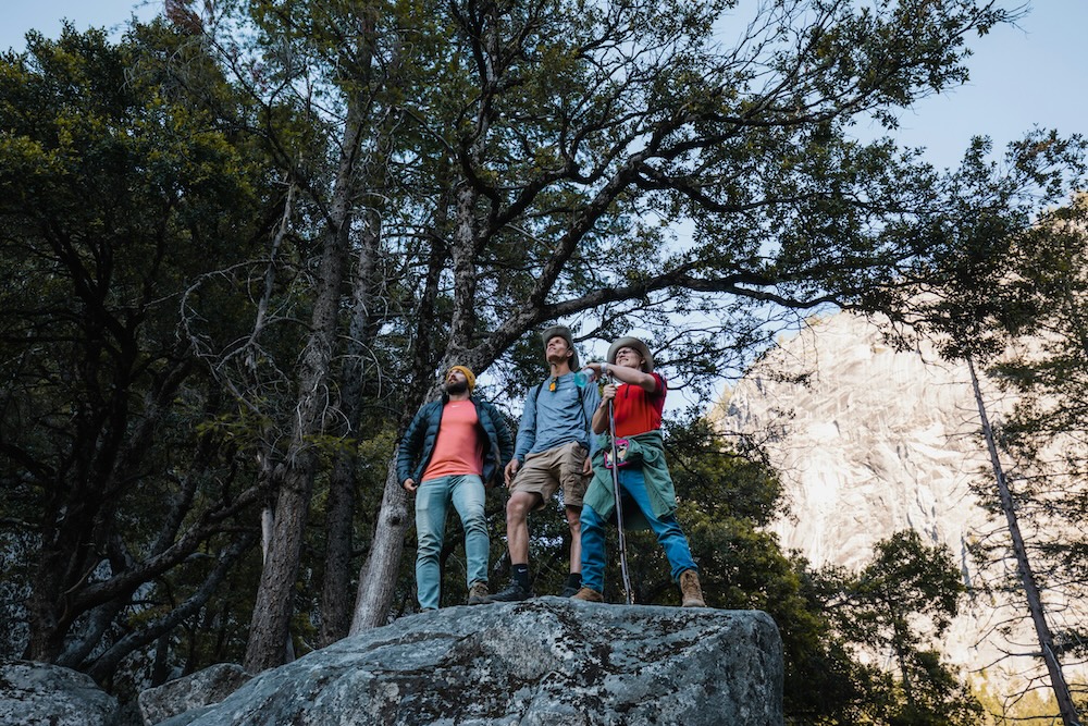 Three men hiking and feeling better than ever after receiving personalized treatments from their doctor for men in Fort Lauderdale.